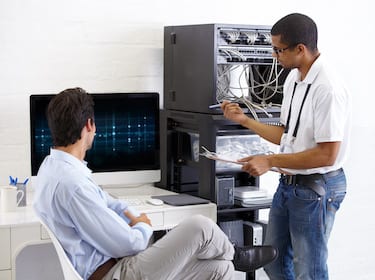 Everyday IT Services team member helping a client